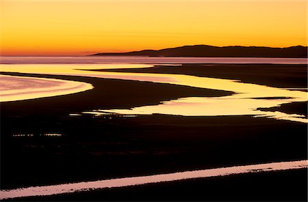 Sunset over Luskentyre Bay, at low tide, west coast of South Harris, Outer Hebrides, Scotland, United Kingdom, Europe Fotografie stock - Rights-Managed, Codice: 841-03064564