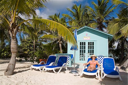 Beach cabana and woman, Princess Cays, Eleuthera Island, Bahamas, West Indies, Central America Stock Photo - Rights-Managed, Code: 841-03065944