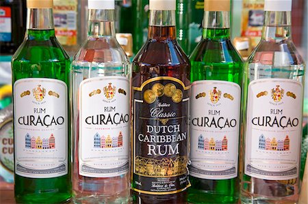 rum - Curacao Rum Bottles, Willemstad, Curacao, Netherlands Antilles, West Indies, Caribbean, Central America Stock Photo - Rights-Managed, Code: 841-03066438