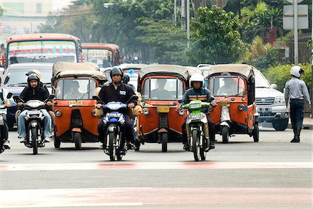 Traffic including tuk-tuk or bajaj, Jakarta, Java, Indonesia, Southeast Asia, Asia Foto de stock - Con derechos protegidos, Código: 841-03066799