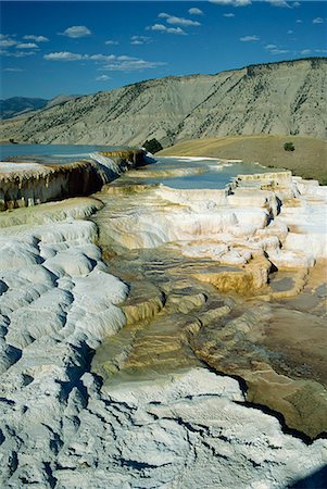 simsearch:841-03062663,k - Limestone terraces formed by volcanic water depositing six inches of calcium carbonate a year, Mammoth Hot Springs and Terraces, Yellowstone National Park, UNESCO World Heritage Site, Wyoming, United States of America, North America Stock Photo - Rights-Managed, Code: 841-03067444