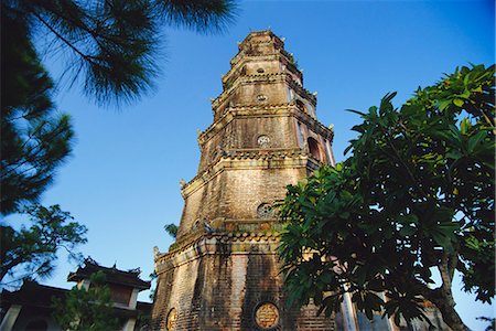 perfume river - Thien Mu Pagoda, 21m octagonal tower of the pagoda by the Perfume River near Hue, Vietnam Stock Photo - Rights-Managed, Code: 841-03067520