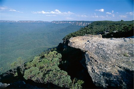 Eucalyptus oil haze causes the blueness in the view from the limestone pavement across the Jamison Valley in the Blue Mountains National Park, UNESCO World Heritage Site, near Katoomba, New South Wales (N.S.W.), Australia, Pacific Stock Photo - Rights-Managed, Code: 841-03067719