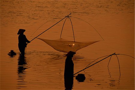 fishing silhouette - The Mekong River, Vientiane, Laos, Indochina, Southeast Asia, Asia Stock Photo - Rights-Managed, Code: 841-03067818