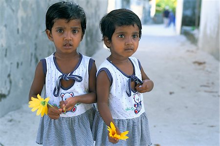 Portrrait of two little girls, Dharavandu Island, Baa Atoll, Maldives, Asia Stock Photo - Rights-Managed, Code: 841-03060364