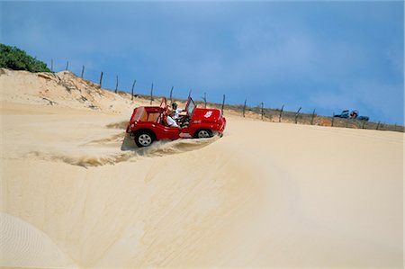 Dune buggy on sand dunes, Pitangui, Natal, Rio Grande do Norte state, Brazil, South America Foto de stock - Con derechos protegidos, Código: 841-03060444
