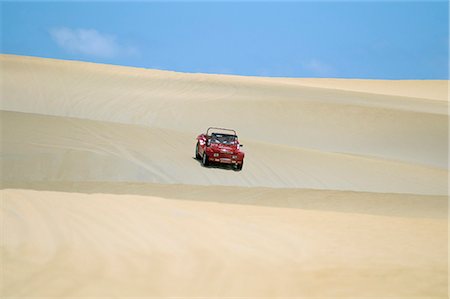 Dune buggy on sand dunes, Pitangui, Natal, Rio Grande do Norte state, Brazil, South America Foto de stock - Con derechos protegidos, Código: 841-03060442