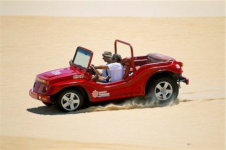 Dune buggy on sand dunes, Pitangui, Natal, Rio Grande do Norte state, Brazil, South America Foto de stock - Con derechos protegidos, Código: 841-03060443