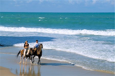 Couple riding horses on the beach, Tibau do Sul, Natal, Rio Grande do Norte state, Brazil, South America Stock Photo - Rights-Managed, Code: 841-03060467