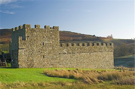 Part reconstruction of wall and tower at Roman settlement and fort at Vindolanda, UNESCO World Heritage Site, Northumbria, England, United Kingdom, Europe Stock Photo - Rights-Managed, Code: 841-03061115