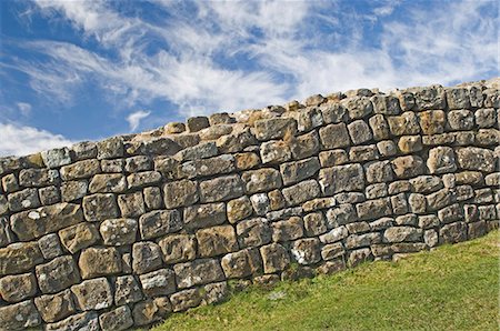 A portion of original Hadrians Wall, chisel marks visible on some stones, Hadrians Wall, UNESCO World Heritage Site, Northumbria, England, United Kingdom, Europe Stock Photo - Rights-Managed, Code: 841-03061145