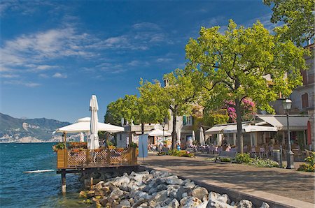 Promenade cafes, Torre del Benaco, Lake Garda, Veneto, Italy, Europe Stock Photo - Rights-Managed, Code: 841-03061322