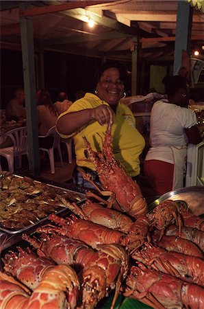 ste lucie - Femme locale vendant des homards à la de fruits de mer le vendredi soir, Anse La Raye, Sainte-Lucie, îles du vent, Antilles, Caraïbes, Amérique centrale Photographie de stock - Rights-Managed, Code: 841-03061775