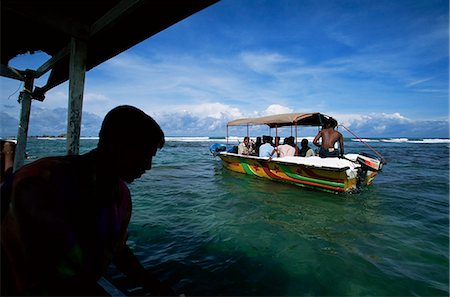 simsearch:841-03061780,k - Glass bottom boats near Hikkaduwa taking tourists to the Coral Sanctuary, Sri Lanka, Asia Fotografie stock - Rights-Managed, Codice: 841-03061818