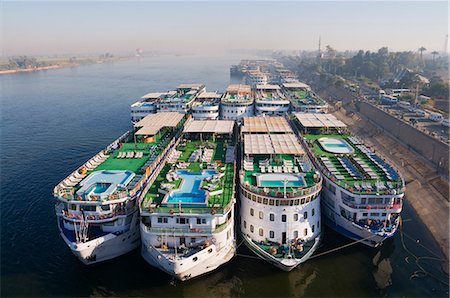 river nile cruise ships - Cruise ships on the Nile, Luxor, Thebes, Middle Egypt, Egypt, North Africa, Africa Stock Photo - Rights-Managed, Code: 841-03062467