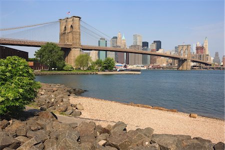 Brooklyn Bridge spanning the East River and Lower Manhattan skyline, from Empire-Fulton Ferry State Park, Brooklyn, New York City, New York, United States of America, North America Stock Photo - Rights-Managed, Code: 841-03454333