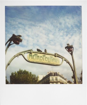 simsearch:841-05795341,k - Polaroid of two pigeons sitting on sign outside Paris Metro, Paris, France, Europe Stock Photo - Rights-Managed, Code: 841-03489614