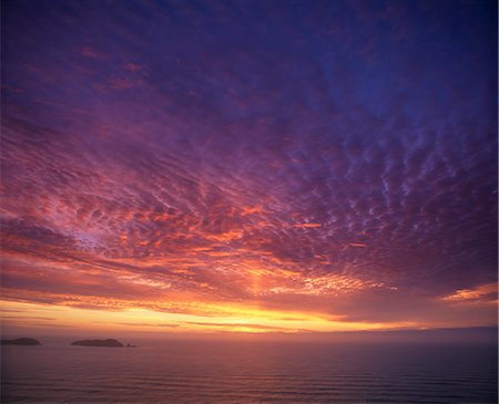 simsearch:841-03489625,k - Colourful skies at dusk, over seascape, New Zealand, Pacific Foto de stock - Con derechos protegidos, Código: 841-03489625