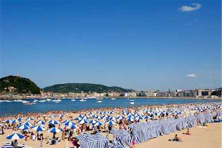 spain san sebastian - Afficher les parasols sur la plage et la ville, San Sebastian, Basque pays, pays basque, Espagne, Europe Photographie de stock - Rights-Managed, Code: 841-03489647