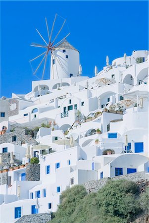 Maisons de stucs et de moulin à vent, Oia, Santorin, Îles Cyclades, îles grecques, Grèce, Europe Photographie de stock - Rights-Managed, Code: 841-03489892