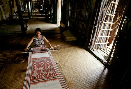 Ikat Weben auf eine Iban Langhaus, Sarawak, Malaysia, Südostasien, Asien Stockbilder - Lizenzpflichtiges, Bildnummer: 841-03483757