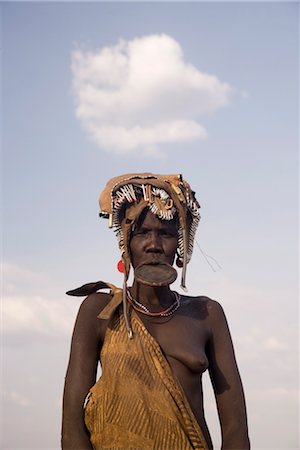 Mursi woman with clay lip plate, Mursi Hills, Mago National Park, Lower Omo Valley, Ethiopia, Africa Stock Photo - Rights-Managed, Code: 841-03505130