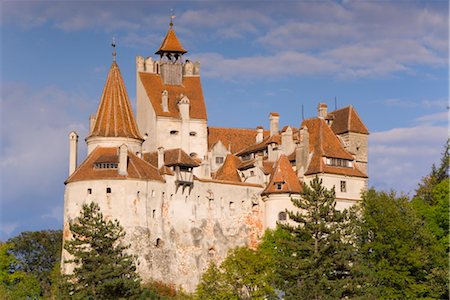 Bran Castle (Dracula's Castle) perched atop a 60m peak in the centre of the village, built by Saxons from Brasov in 1382, Bran, Prahova Valley, Saxon Land, Transylvania, Romania, Europe Stock Photo - Rights-Managed, Code: 841-03505140