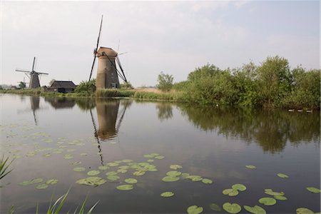 Kinderdijk windmills, Holland, Europe Fotografie stock - Rights-Managed, Codice: 841-03505669