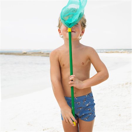 simsearch:841-03507749,k - Boy (6-8) on beach with fishing pole Stock Photo - Rights-Managed, Code: 841-03507727