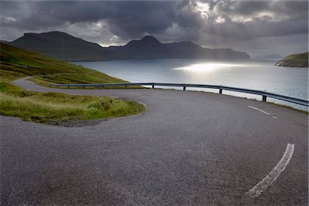 faroe islands - Winding road near Kvivik, and Vestmannasund between Vagar on the right, and Streymoy islands, from Streymoy, Faroe Islands (Faroes), Denmark, Europe Stock Photo - Rights-Managed, Code: 841-03507814