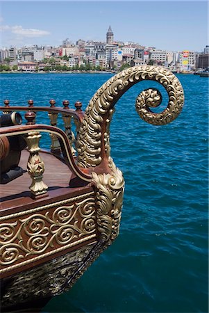 simsearch:862-03355075,k - Decorative boat on the Golden Horn with the Galata Tower and Beyoglu district in the background, Istanbul, Turkey, Europe Stock Photo - Rights-Managed, Code: 841-03508008