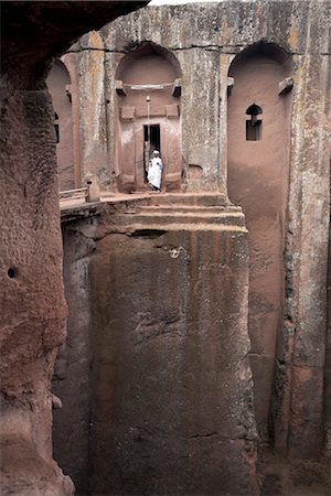 simsearch:841-02715460,k - A priest stands at the entrance to the rock-hewn church of Bet Gabriel-Rufael, in Lalibela, UNESCO World Heritage Site, Ethiopia, Africa Stock Photo - Rights-Managed, Code: 841-03502451