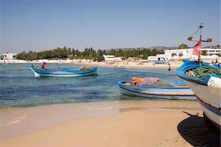 Fishing boats and beach, Hammamet, Tunisia, North Africa, Africa Foto de stock - Con derechos protegidos, Código: 841-03502482