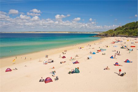 saint ives - Holidaymakers and tourists sunbathing on Porthminster beach, St. Ives (Pedn Olva), North Cornwall, England, United Kingdom, Europe Foto de stock - Con derechos protegidos, Código: 841-03517194