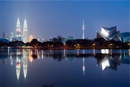 park light - Petronas Towers and Istana Budaya National Theatre, Lake Titiwangsa, Kuala Lumpur, Malaysia, Southeast Asia, Asia Stock Photo - Rights-Managed, Code: 841-03517341