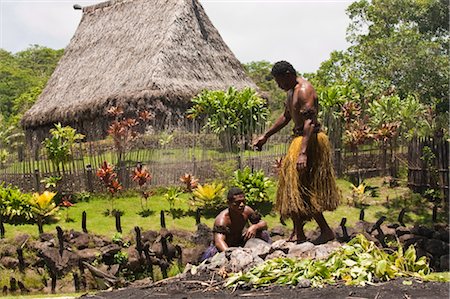 people and thatched houses - Polynesian Cultural Center, Viti Levu, Fiji, South Pacific, Pacific Stock Photo - Rights-Managed, Code: 841-03518573