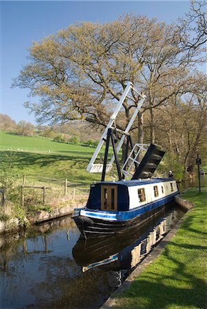 passing outdoor photos - Narrow boat passing through a lift bridge, Llangollen Canal, Wales, United Kingdom, Europe Stock Photo - Rights-Managed, Code: 841-03518773