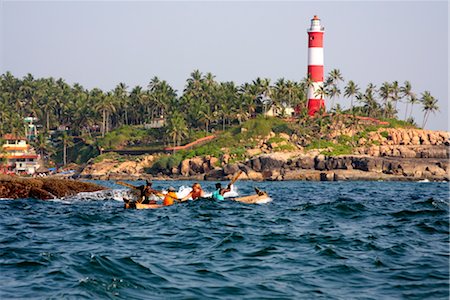 Tourists in a boat, Kovalam, Trivandrum, Kerala, India Stock Photo - Rights-Managed, Code: 841-03520026