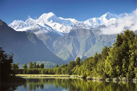 simsearch:841-09194495,k - Lake Matheson, Mount Tasman and Mount Cook, Westland Tai Poutini National Park, UNESCO World Heritage Site, West Coast, Southern Alps, South Island, New Zealand, Pacific Stock Photo - Rights-Managed, Code: 841-03674225