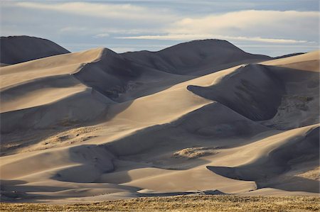 simsearch:6119-08268794,k - Great Sand Dunes late in the afternoon, Great Sand Dunes National Park and Preserve, Colorado, United States of America, North America Foto de stock - Con derechos protegidos, Código: 841-03674482