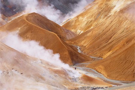 Hikers exploring the very active hot spring area at Kerlingarfjoll, where Kerlingarfjoll Mountains in the interior are a massif of rhyolitic domes rising to 1477m, Iceland, Polar Regions Stock Photo - Rights-Managed, Code: 841-03674746