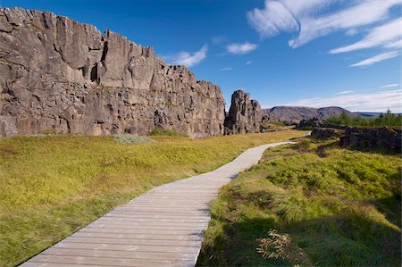 pingvellir national park - The Almannagja (All Man's Gorge) cliff face is the backdrop of the Althing, legislative assembly of the past, also the edge of the north American tectonic plate, Thingvellir National Park, UNESCO World Heritage Site, south-west Iceland (Sudurland), Iceland, Polar Regions Stock Photo - Rights-Managed, Code: 841-03674782