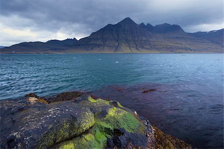 simsearch:841-03674786,k - Mount Bulanstindur distinctive conical shape from the shores of Berufjordur fjord, East Fjords region (Austurland), Iceland, Polar Regions Stock Photo - Rights-Managed, Code: 841-03674797