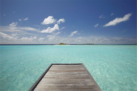 dock in maldives - Wooden jetty and tropical sea, view from island, Maldives, Indian Ocean, Asia Stock Photo - Rights-Managed, Code: 841-03675002