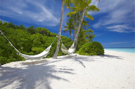 Hammock on empty tropical beach, Maldives, Indian Ocean, Asia Foto de stock - Con derechos protegidos, Código: 841-03675010