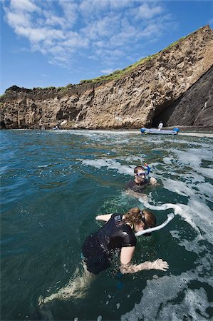 Snorkelling at Vincente Roca Point on Isla Isabela (Isabela Island), Galapagos Islands, UNESCO World Heritage Site, Ecuador, South America Foto de stock - Con derechos protegidos, Código: 841-03675155