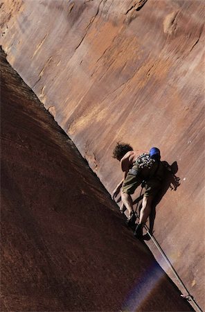 simsearch:841-03675371,k - A climber tackles an overhanging corner on the cliffs of Indian Creek, a famous rock climbing area near Moab, Utah, United States of America, North America Fotografie stock - Rights-Managed, Codice: 841-03675359