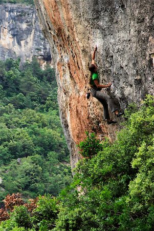 simsearch:841-03675371,k - A woman tackles a very difficult climb on limestone cliffs near Siuarana, a medieval village near Reus and Barcelona, Catalonia, Spain, Europe Fotografie stock - Rights-Managed, Codice: 841-03675374