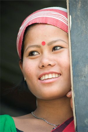Smiling married woman from the Mishing tribe wearing typical Assamese domestically woven scarf, Majuli Island, Assam, India, Asia Stock Photo - Rights-Managed, Code: 841-03675449