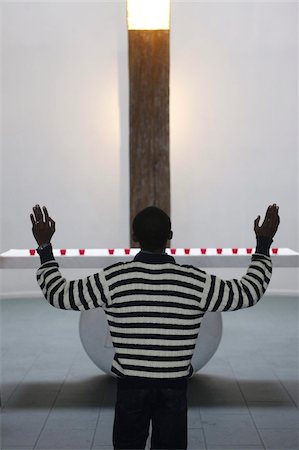 African man  in a church, Paris, France, Europe Fotografie stock - Rights-Managed, Codice: 841-03676022